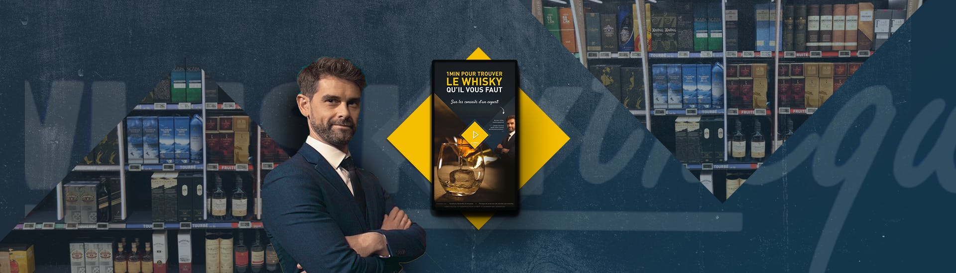 Photo de Nicola Julhes devant la borne interactive de Moët Hennessy Diageo